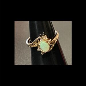 14K Solid Gold Vintage Natural Opal Ring with Diamond Accents.
Market GRP
3 1/2